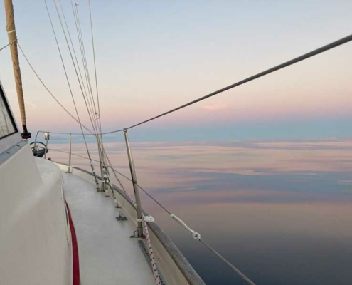 sundown-mirror crossing_atlantic_sailing_eastbound
